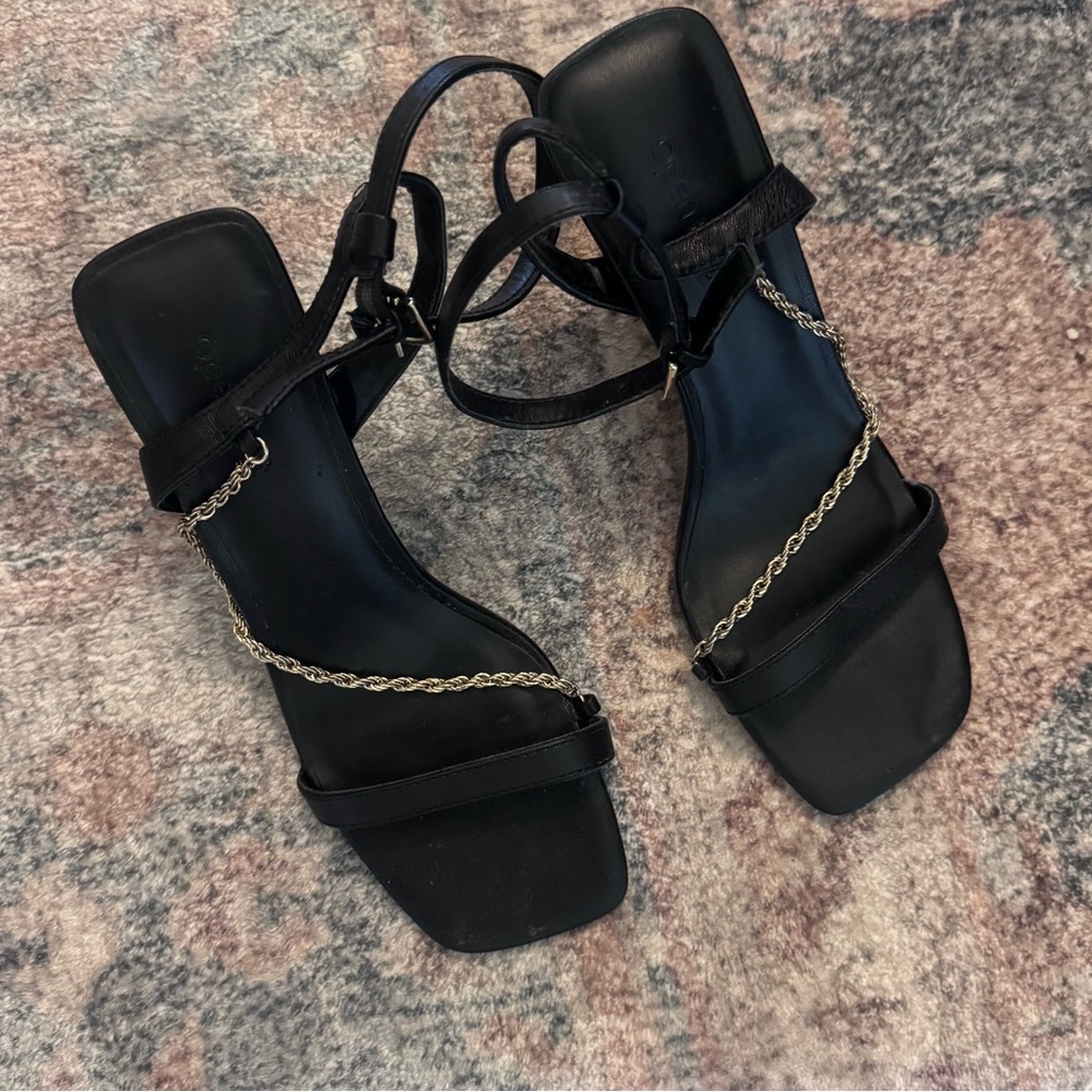 Strappy black heels